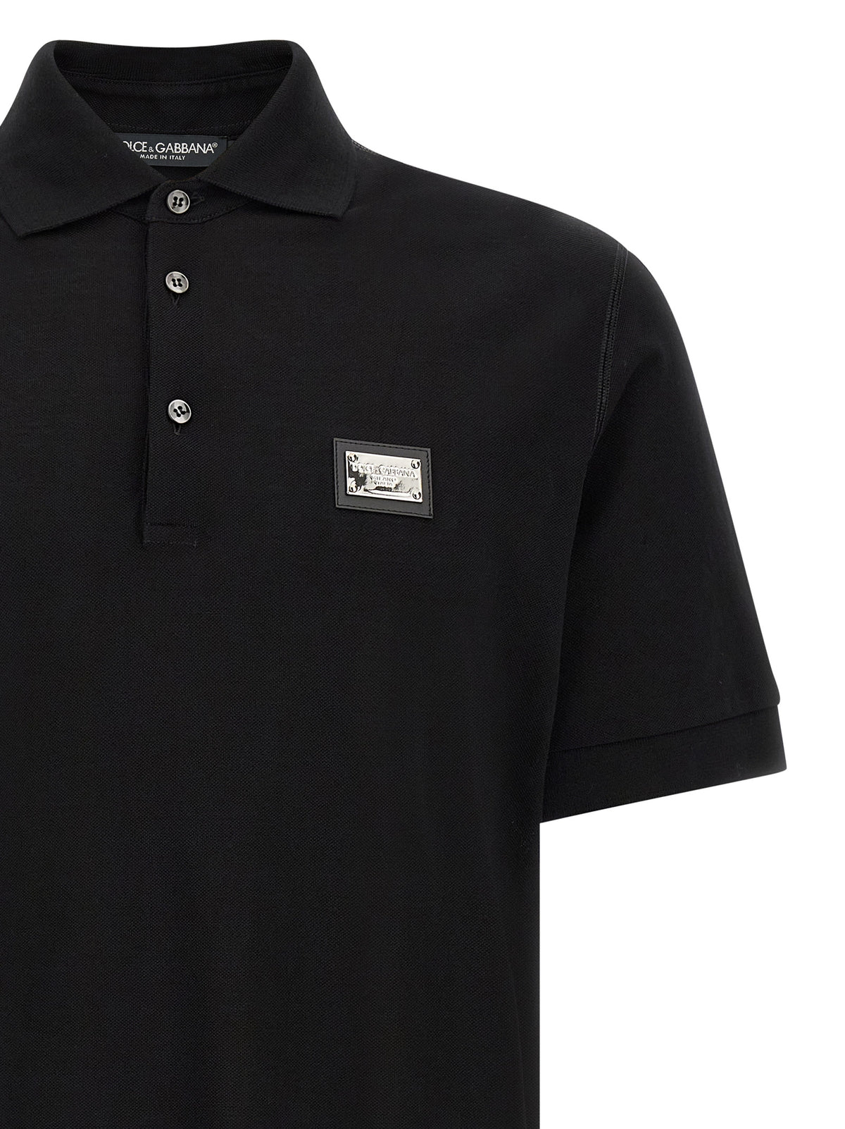 Polo Shirt by Dolce & Gabbana for men in cotton black presents a crisp silhouette, artfully detailed with a crisp and crisp .