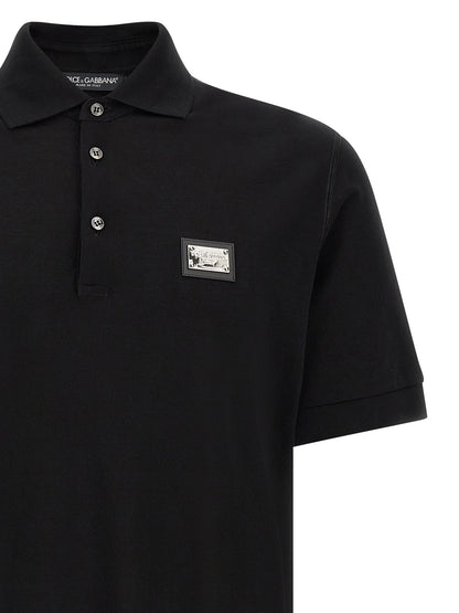Polo Shirt by Dolce & Gabbana for men in cotton black presents a crisp silhouette, artfully detailed with a crisp and crisp .