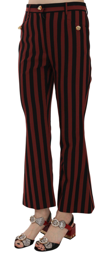 Trousers by Dolce & Gabbana for women in stretch polyester & rayon black, red & striped features a tailored silhouette with a tailored flared & cropped, defined by its cropped and a sophisticated .