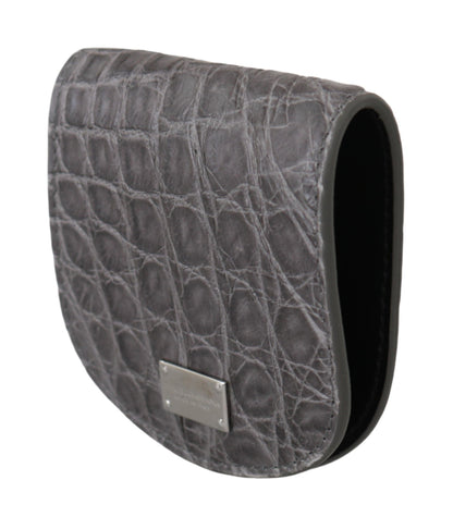 Small Toiletry Bag by Dolce & Gabbana for unisex in exotic skin leather gray features an distinguished Exotic Skin Leather Small Toiletry Bag design with a secure snap & button, organized cardholder & coin-purse, and distinguished for a sophisticated finish.