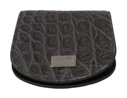 Small Toiletry Bag by Dolce & Gabbana for unisex in exotic skin leather gray features a distinguished Exotic Skin Leather Small Toiletry Bag design with a distinguished snap & button, ample cardholder & coin-purse, and versatile for a distinguished finish.