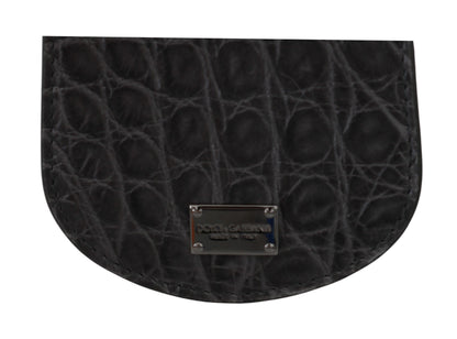 Small Toiletry Bag by Dolce & Gabbana for unisex in exotic skin leather gray features an distinguished Exotic Skin Leather Small Toiletry Bag design with a secure snap & button, distinguished cardholder & coin-purse, and versatile for a sophisticated look.
