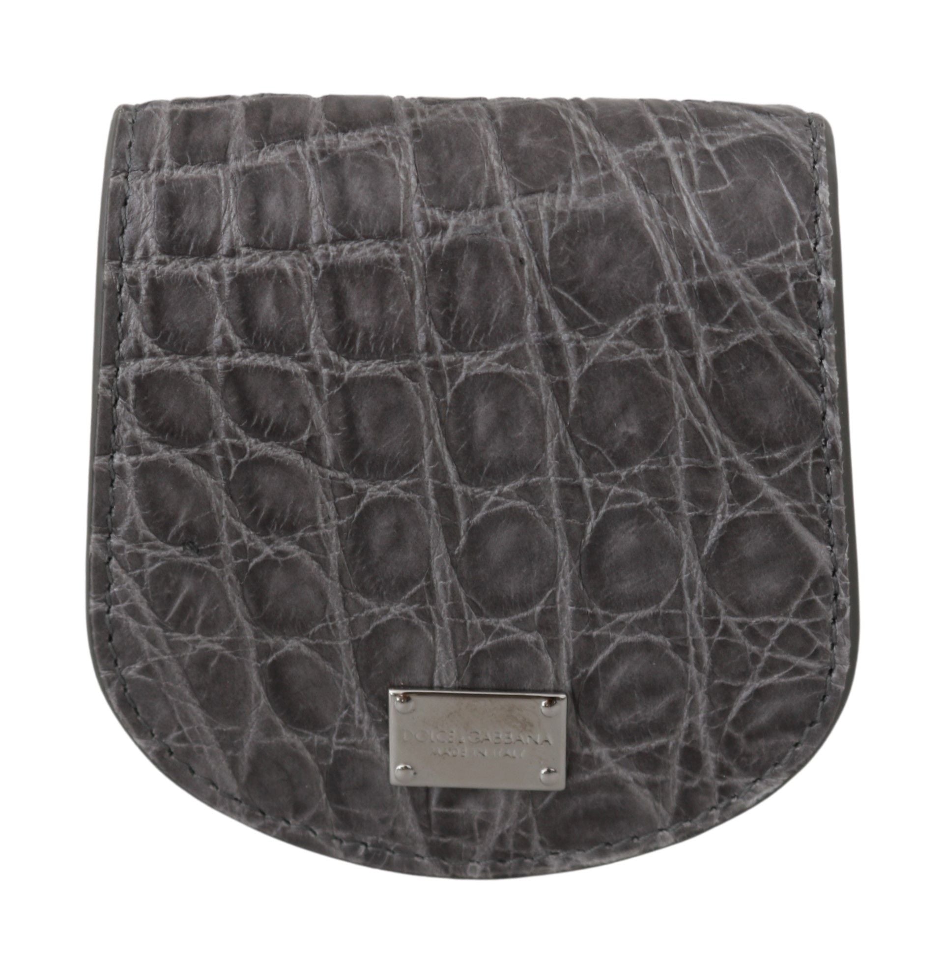Small Toiletry Bag by Dolce & Gabbana for unisex in exotic skin leather gray features an distinguished Exotic Skin Leather Small Toiletry Bag design with a secure snap & button, distinguished cardholder & coin-purse, and versatile .