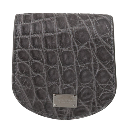 Small Toiletry Bag by Dolce & Gabbana for unisex in exotic skin leather gray features an distinguished Exotic Skin Leather Small Toiletry Bag design with a secure snap & button, distinguished cardholder & coin-purse, and versatile .
