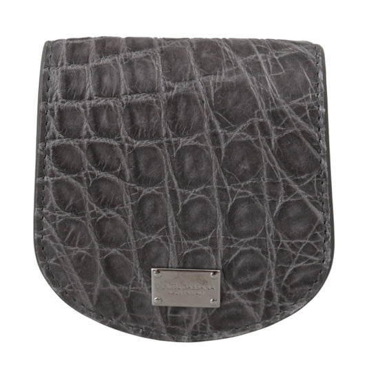 Small Toiletry Bag by Dolce & Gabbana for unisex in exotic skin leather gray features an distinguished Exotic Skin Leather Small Toiletry Bag design with a secure snap & button, distinguished cardholder & coin-purse, and versatile .