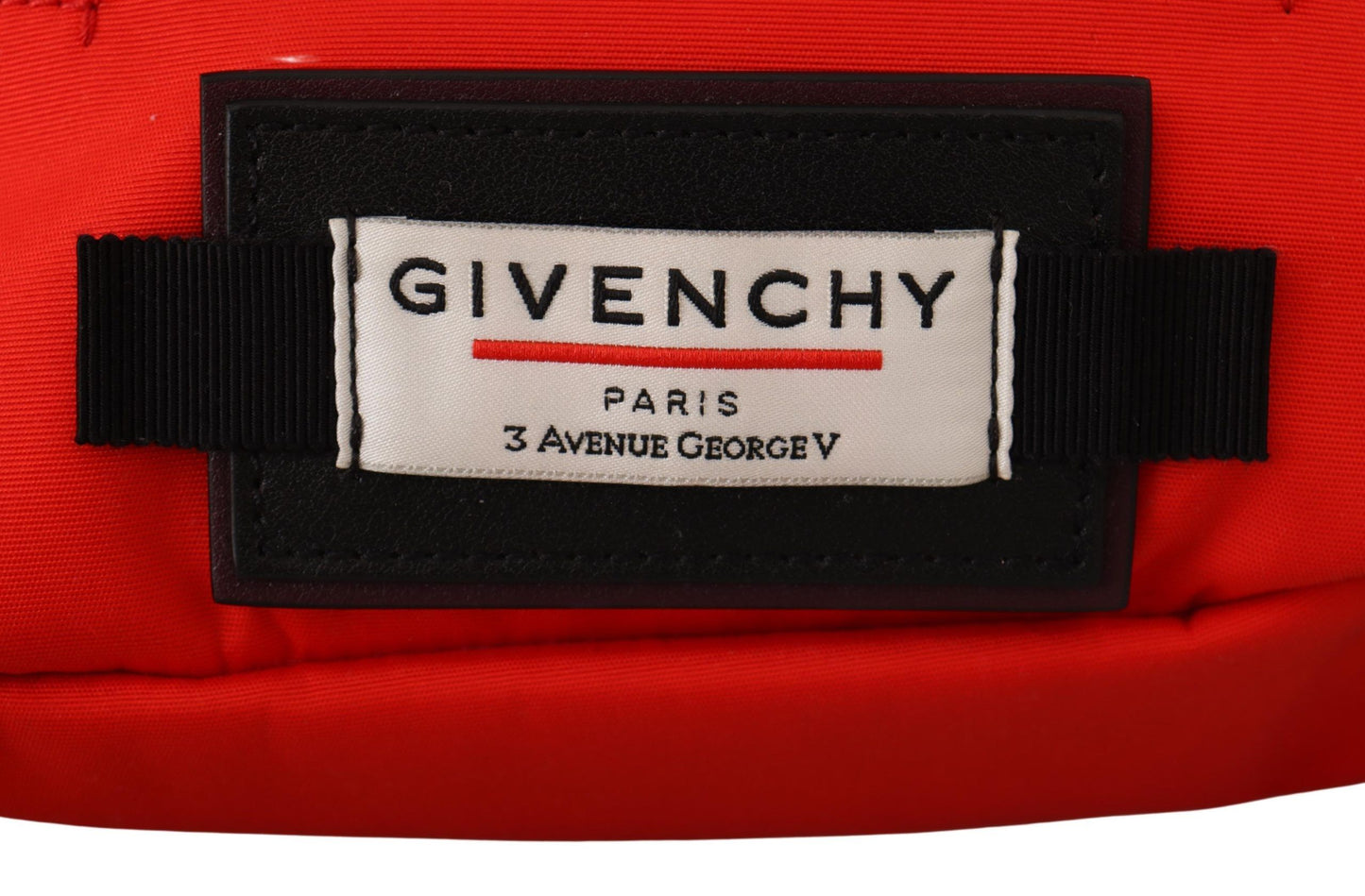 Large Fanny Pack Backpack by Givenchy for men in polyamide black, red & silver features a refined silhouette, showcasing the Polyamide Large Fanny Pack Backpack design with a secure zipper, ample , and versatile adjustable-strap & belt-strap.