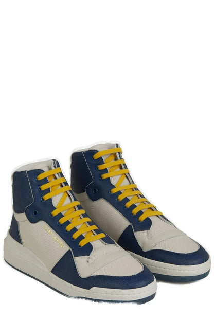 Sneakers by Saint Laurent for men in calf leather & rubber blue & print features an fashionable silhouette, showcasing the premium Men's Mid Top Calf Leather & Rubber Sneakers in a fashionable mid-top style that offers a fashionable finish for refined style.