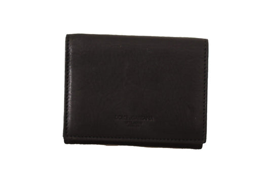 Wallet by Dolce & Gabbana for women in leather black presents a streamlined silhouette, showcasing the sophisticated design of the Leather Wallet collection with functional compact-design trifold.