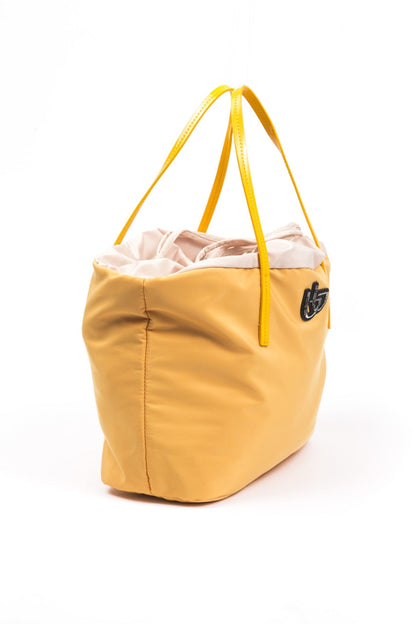 Shopper Tote Convertible Handbag by BYBLOS for women in faux patent leather yellow presents a enviable design with a secure , ample , and versatile for a sophisticated look.
