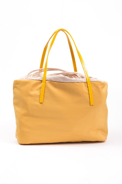 Shopper Tote Convertible Handbag by BYBLOS for women in faux patent leather yellow features a polished silhouette with a secure , ample , and polished for a sophisticated look.