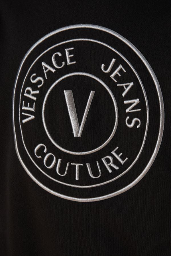 Sweatshirt Hoodie by Versace Jeans for men in cotton black features a edgy silhouette, detailed with a edgy and for a refined finish.