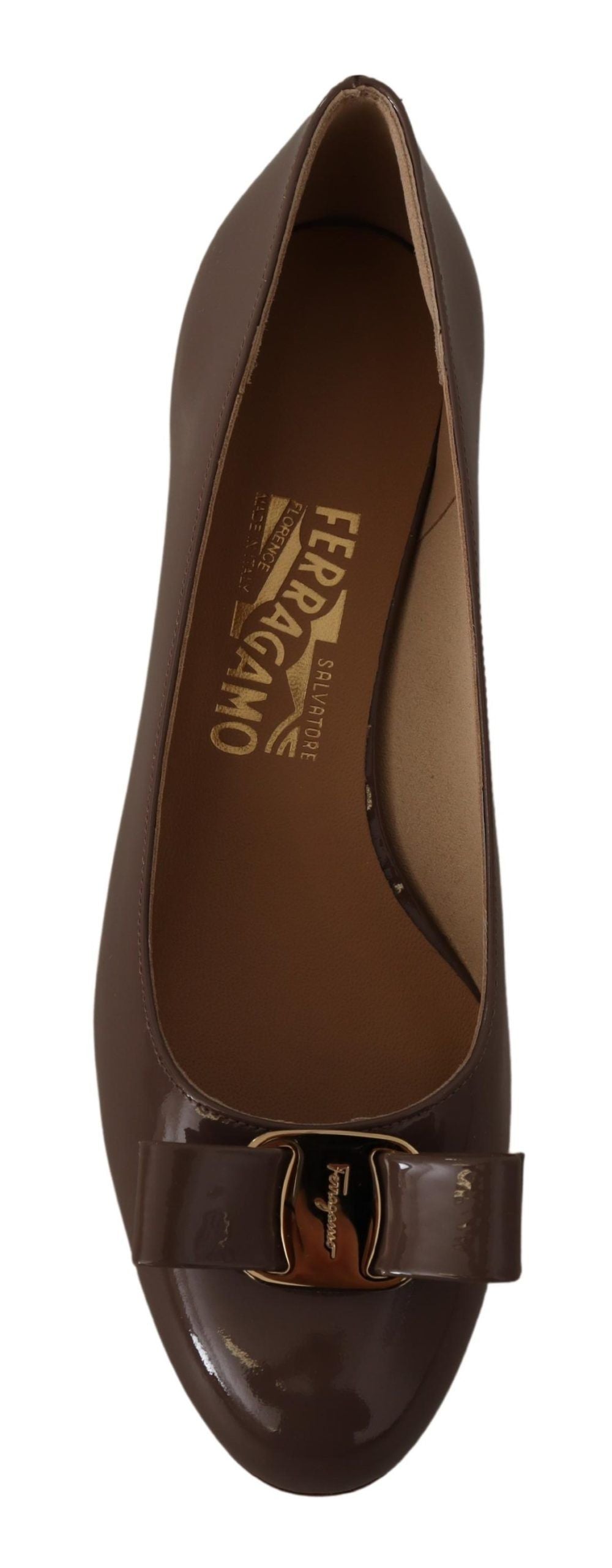 Low-Heel Pumps Heels by Salvatore Ferragamo for women in calf leather brown features an effortlessly chic silhouette from the City Women's Calf Leather Low-Heel Pumps Heels collection, showcasing a 3-cm-heel low-heel and effortlessly chic for a effortlessly chic look.
