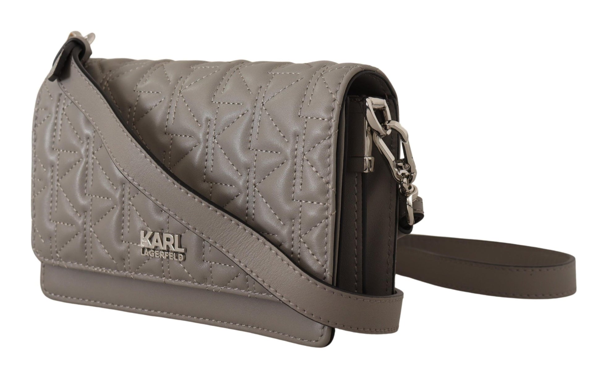 Travel Crossbody Flap Convertible Handbag by Karl Lagerfeld for women in leather gray, light-grey & silver features an exquisite silhouette, showcasing a secure snap, flap & zipper, ample built-in-compartments, and versatile crossbody-strap, shoulder-strap & adjustable-strap for exquisite style.