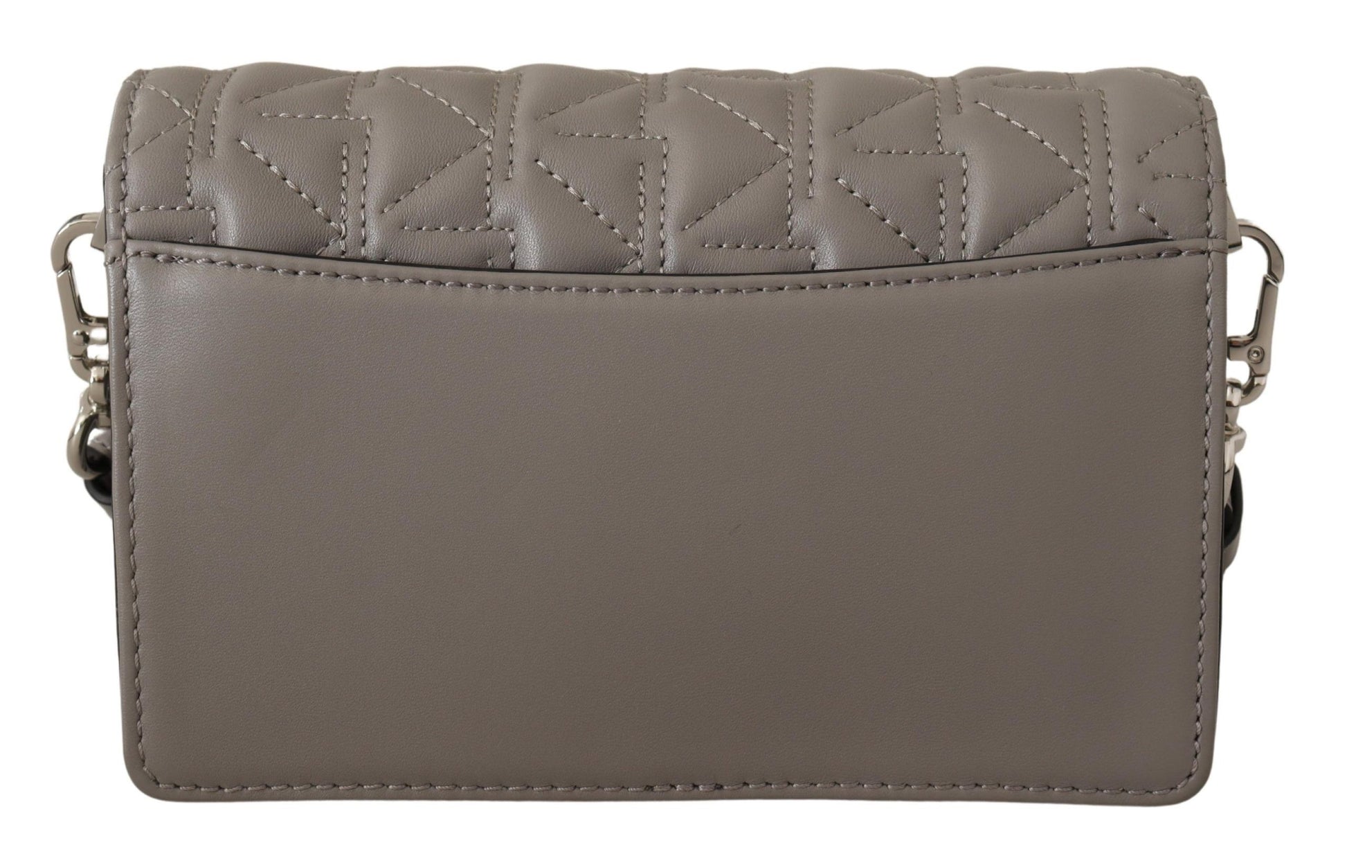 Travel Crossbody Flap Convertible Handbag by Karl Lagerfeld for women in leather gray, light-grey & silver features an exquisite silhouette, showcasing a secure snap, flap & zipper, ample built-in-compartments, and exquisite crossbody-strap, shoulder-strap & adjustable-strap for a sophisticated finish.