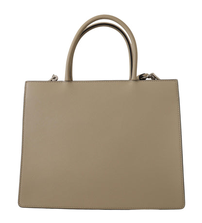 2-in-1 Shoulder & Crossbody Travel Tote Convertible Handbag by Karl Lagerfeld for women in polyurethane green & silver features an exquisite silhouette, showcasing a secure zipper, ample built-in-compartments, and versatile crossbody-strap, shoulder-strap & adjustable-strap for exquisite style.