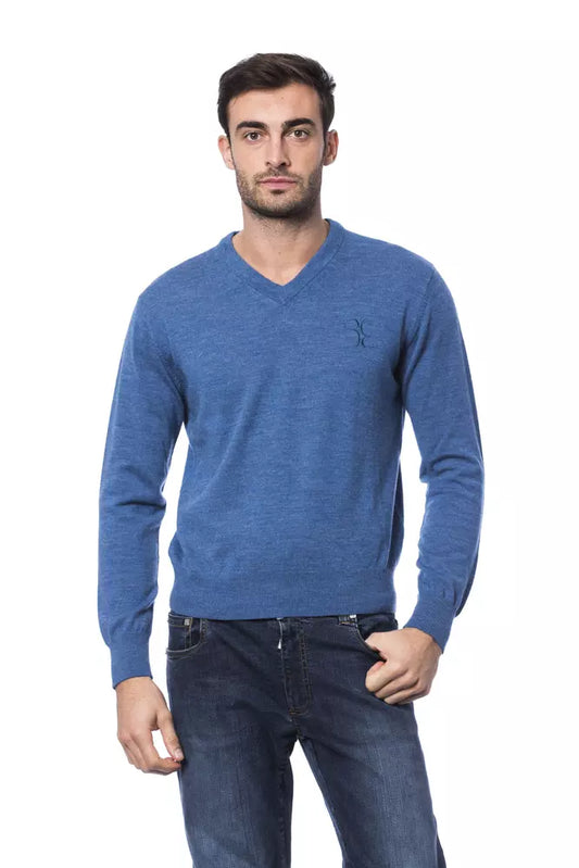 This Sweater by Billionaire Italian Couture for men in merino wool blue presents a understated silhouette, featuring a sophisticated crew neckline and for a understated finish.