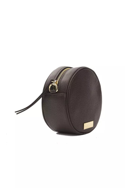 Small Crossbody Oval Handbag by Pompei Donatella for women in leather brown features a versatile chic silhouette, meticulously detailed with a secure , ample , and versatile crossbody-strap.