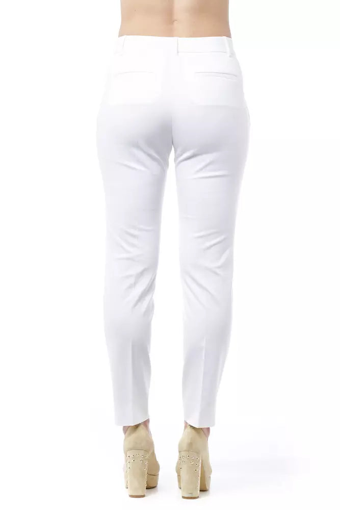 Trousers by Peserico for women in cotton white features an on trend silhouette, showcasing a sophisticated slim & cigarette with a long and high rise for an on trend finish.