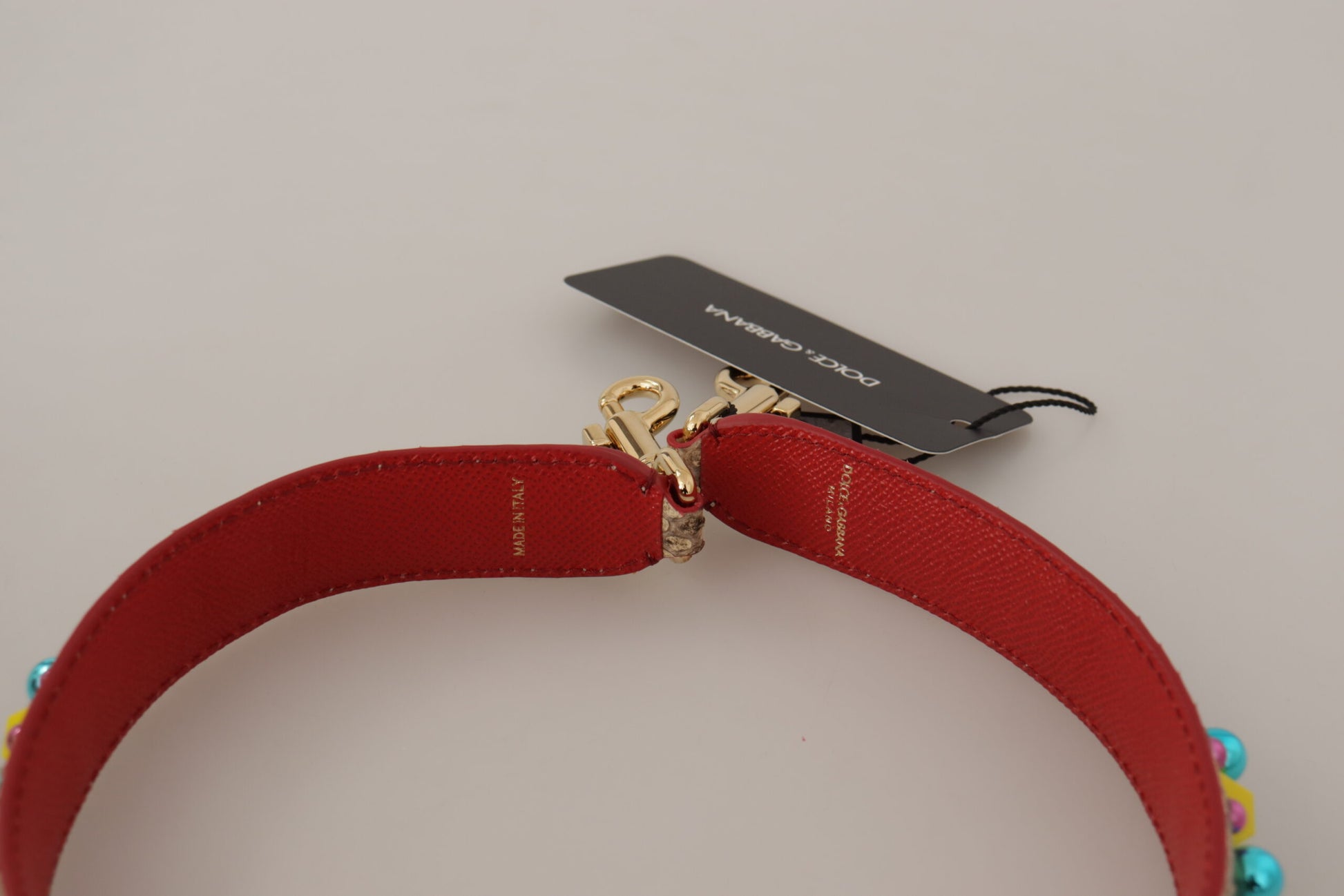 Shoulder Strap from Dolce & Gabbana for unisex in python leather & crystal beige & gold features an on trend design from the Python Leather Crystal Shoulder Strap collection, highlighting a premium look.
