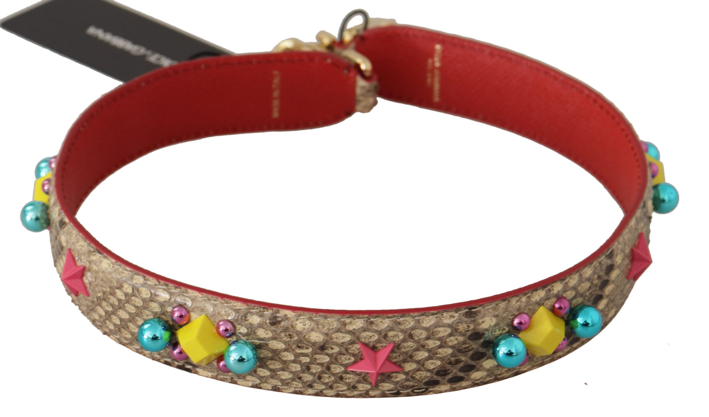 Shoulder Strap by Dolce & Gabbana for unisex in python leather & crystal beige & gold features an stylish design, beautifully completing the signature look of the Python Leather Crystal Shoulder Strap.