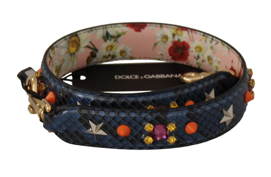 Shoulder Strap by Dolce & Gabbana for unisex in exotic leather & crystal blue & gold features a contemporary design, highlighting the distinctive style of the Exotic Leather Crystal Shoulder Strap with a contemporary finish.