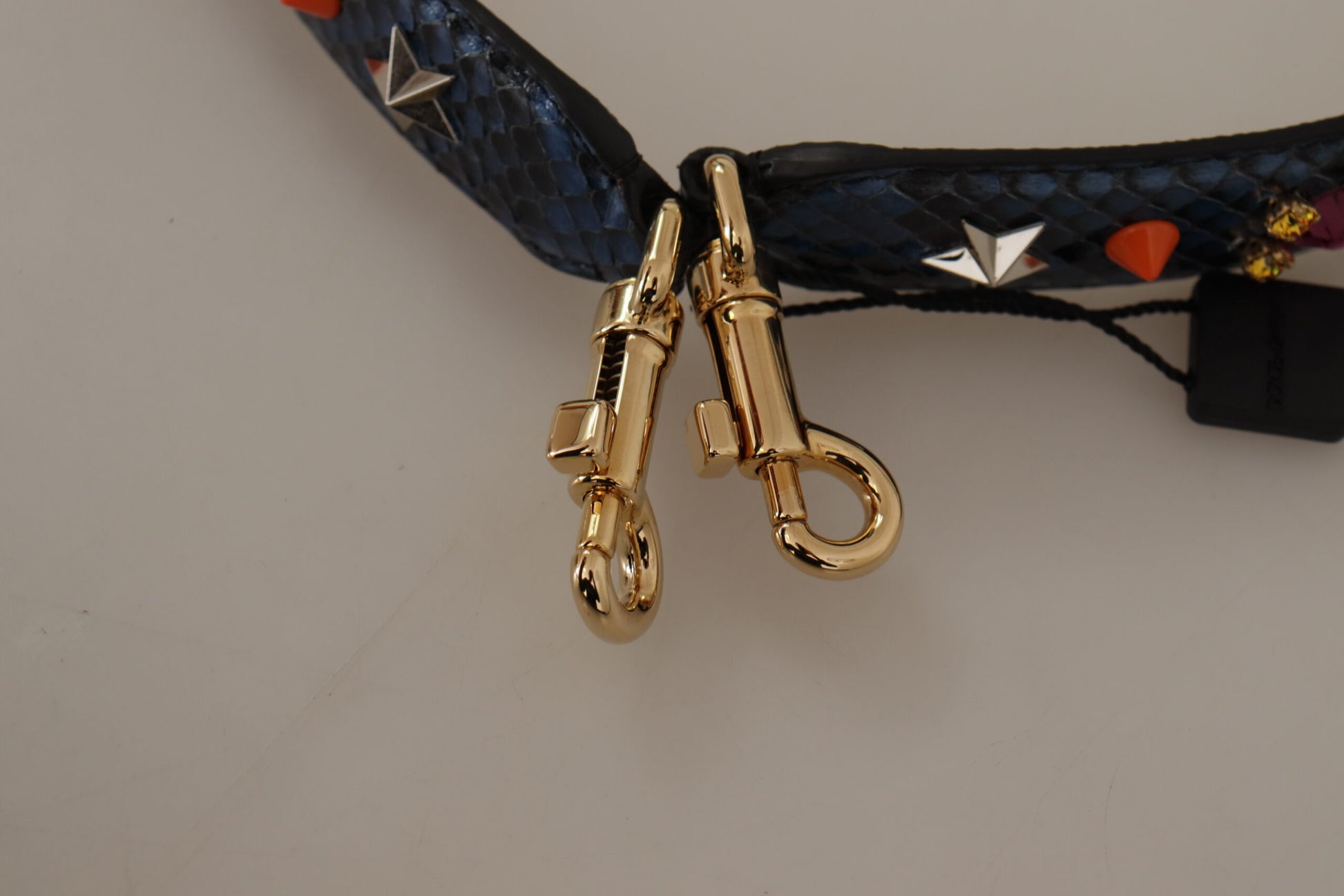 Shoulder Strap from Dolce & Gabbana for unisex in exotic leather & crystal blue & gold features an on trend design from the Exotic Leather Crystal Shoulder Strap collection, highlighting a premium look.