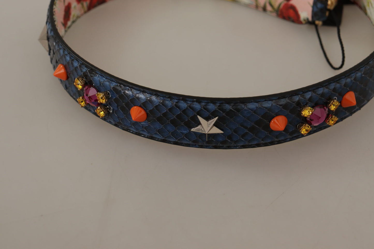 Shoulder Strap by Dolce & Gabbana for unisex in exotic leather & crystal blue & gold showcases a enviable design, perfect for elevating any ensemble as part of the Exotic Leather Crystal Shoulder Strap collection.