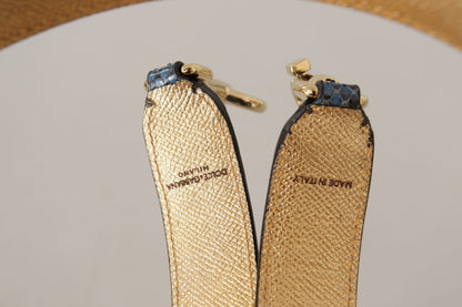Shoulder Strap by Dolce & Gabbana for unisex in python leather blue & gold features a effortlessly chic design, perfectly complementing the signature look of the Python Leather Shoulder Strap.