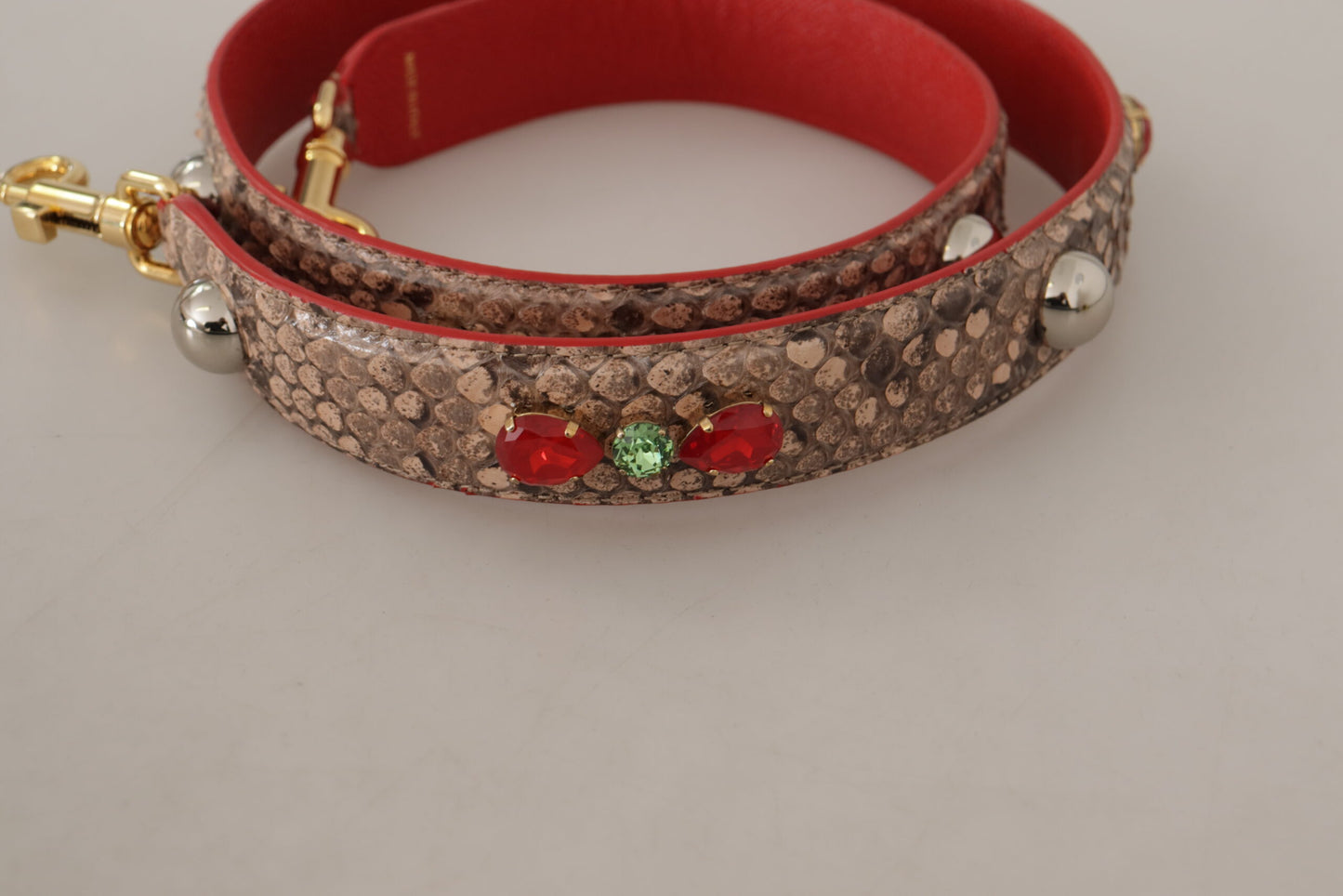 Shoulder Strap by Dolce & Gabbana for unisex in python leather brown & gold features a contemporary design, highlighting the distinctive style of the Python Leather Shoulder Strap with a contemporary finish.