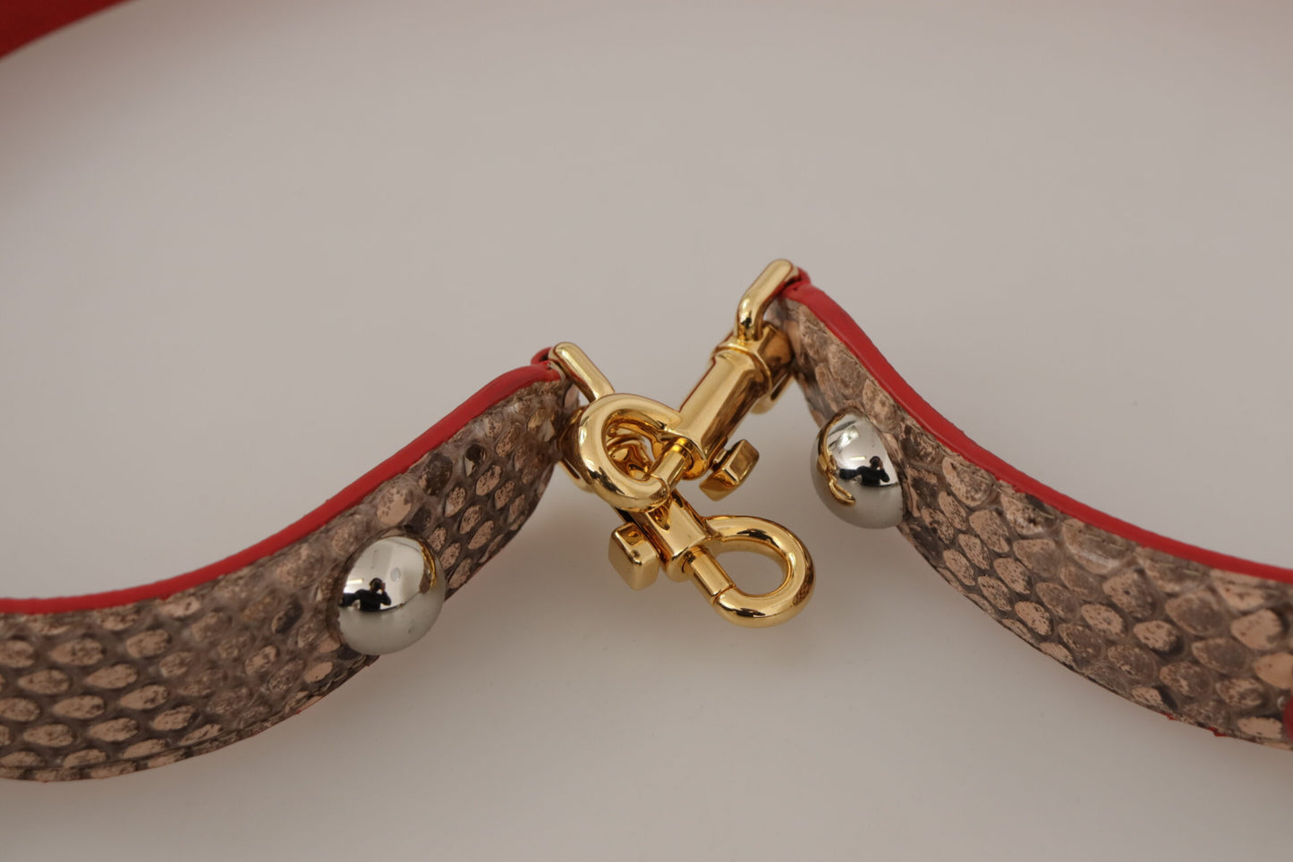 Shoulder Strap by Dolce & Gabbana for unisex in python leather brown & gold showcases a enviable design, perfect for elevating any ensemble as part of the Python Leather Shoulder Strap collection.