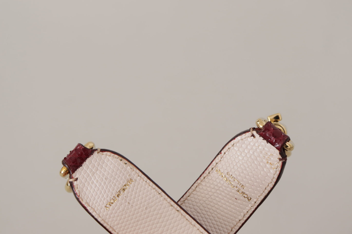 Shoulder Strap by Dolce & Gabbana for unisex in python leather bordeaux, gold & red features an stylish design, beautifully completing the signature look of the Python Leather Shoulder Strap.