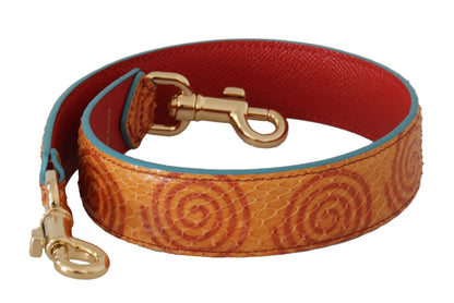 Shoulder Strap by Dolce & Gabbana for unisex in leather & metal gold, orange & print features a effortlessly chic design, perfectly complementing the signature look of the Leather Metal Shoulder Strap.