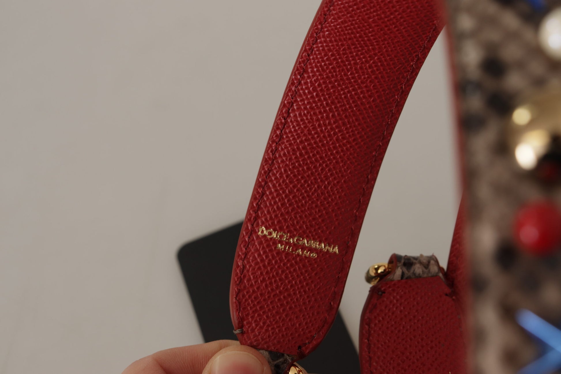 Shoulder Strap by Dolce & Gabbana for unisex in python leather brown & gold showcases a enviable design, perfect for elevating any ensemble as part of the Python Leather Shoulder Strap collection.