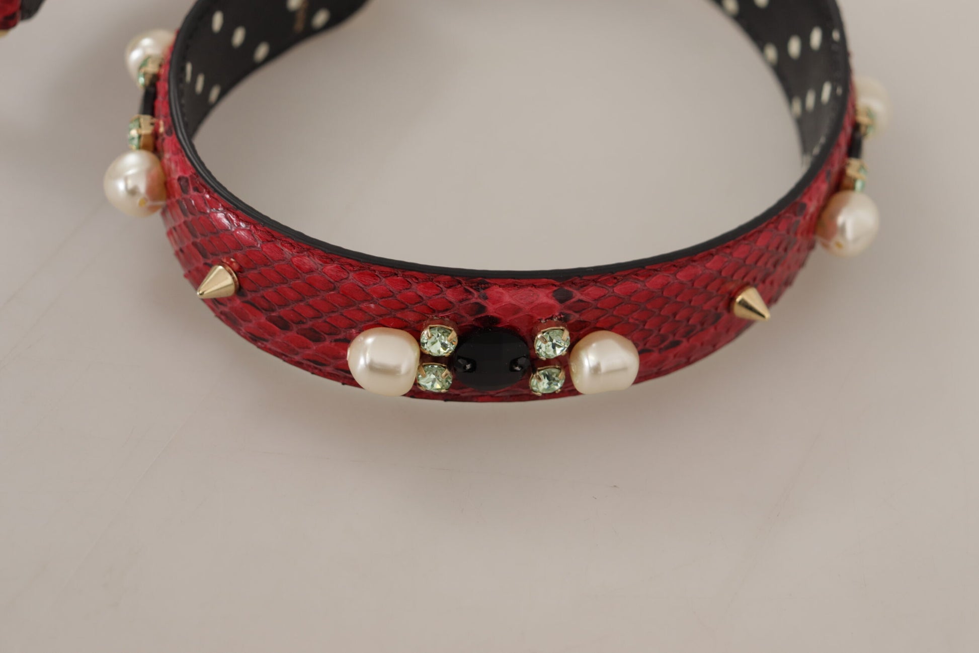Shoulder Strap by Dolce & Gabbana for unisex in python leather & crystal cherry, gold & red features an stylish design, beautifully completing the signature look of the Python Leather Crystal Shoulder Strap.