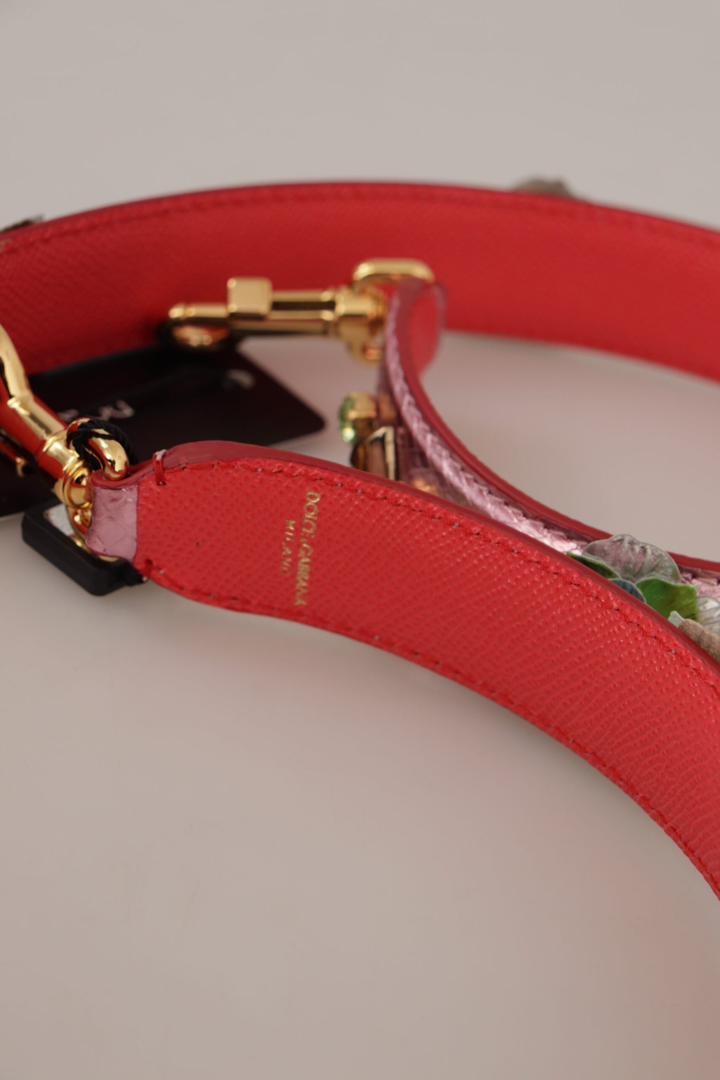 Shoulder Strap by Dolce & Gabbana for unisex in leather & metal gold & pink showcases a enviable design, perfect for elevating any ensemble as part of the Leather Metal Shoulder Strap collection.