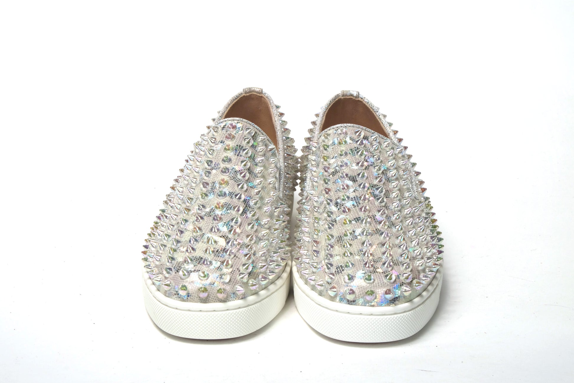 Sneakers by Christian Louboutin for women in calf leather white & signature features an opulent silhouette from the Women's Slip On Calf Leather Sneakers collection, showcasing a signature slip-on style with an opulent finish.