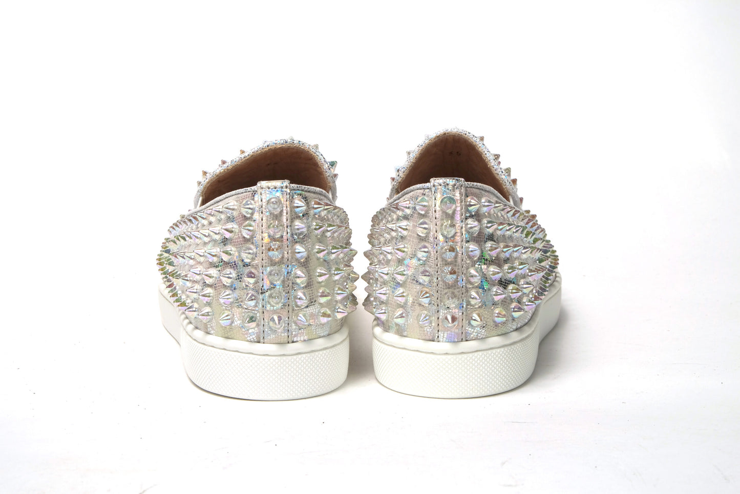 Sneakers by Christian Louboutin for women in calf leather white & signature features a sumptuous design, perfectly showcasing the sumptuous slip-on style of this Women's Slip On Calf Leather Sneakers.