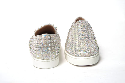 Sneakers by Christian Louboutin for women in calf leather white & signature presents a sumptuous silhouette, artfully capturing the essence of the Women's Slip On Calf Leather Sneakers with its sumptuous slip-on style design.