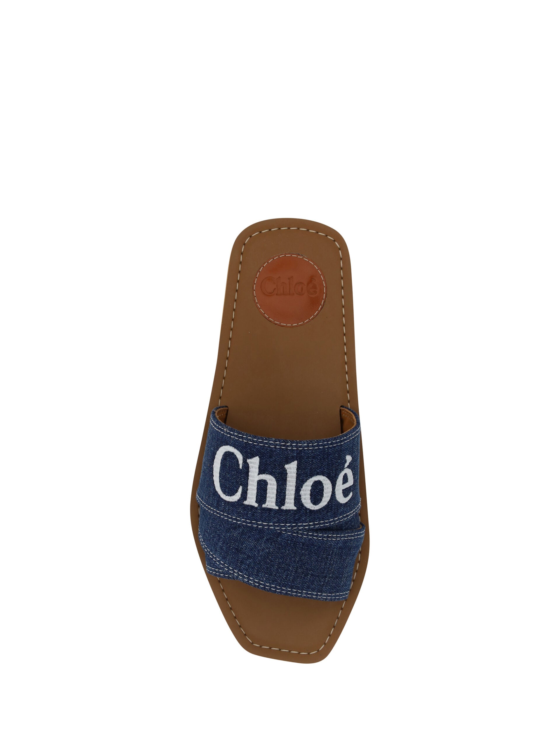 Flat Slider Sandals by Chloé for women in plush cotton denim and blue & signature presents a captivating silhouette, showcasing the signature style of the Essence Grace Woody Women's Plush Cotton Denim Flat Slider Sandals with a captivating flat and captivating square toe style.