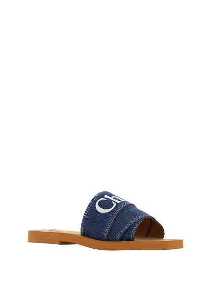 Flat Slider Sandals by Chloé for women in plush cotton denim blue & signature features an statuesque Essence Grace Woody Women's Plush Cotton Denim Flat Slider Sandals silhouette with a refined flat and elegant square toe style.