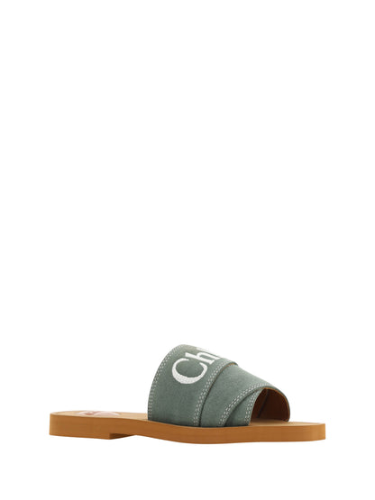 Flat Slider Sandals by Chloé for women in cotton & rubber green, patterned & signature features an exquisite silhouette, showcasing the exquisite Essence Women's Cotton & Rubber Flat Slider Sandals with a flat and square toe style.