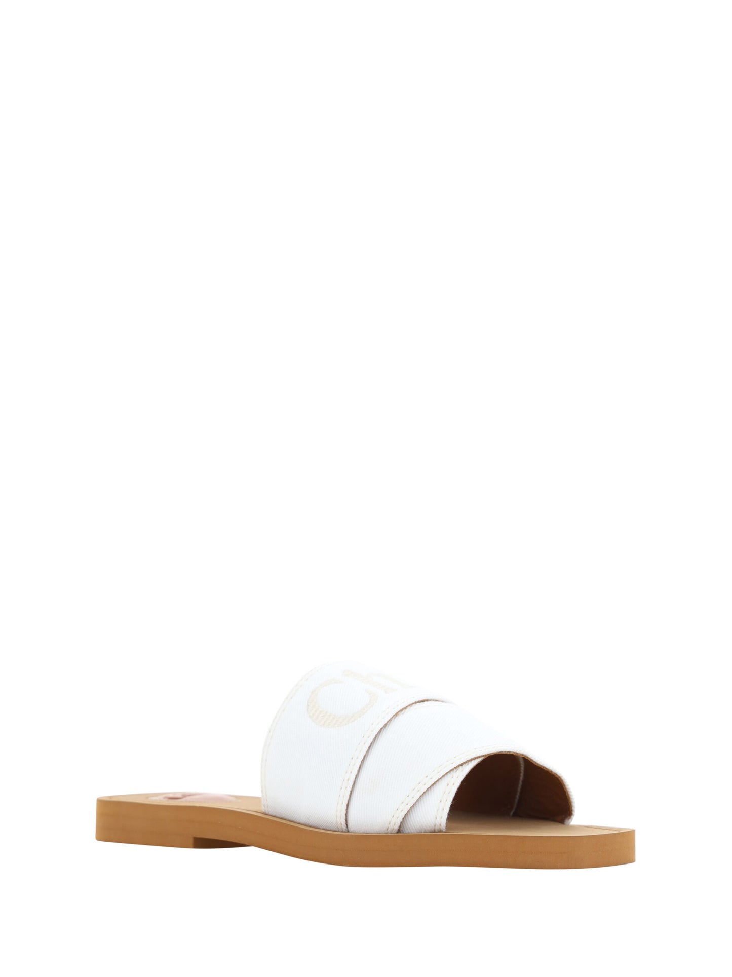 Flat Slider Sandals by Chloé for women in cotton & rubber white & signature features an statuesque Woody Women's Cotton & Rubber Flat Slider Sandals silhouette with a refined flat and elegant square toe style.