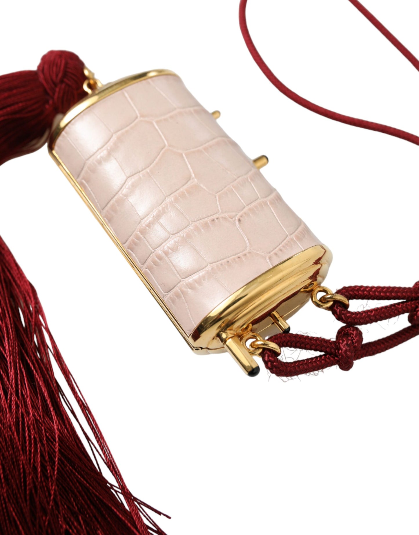 Mini Makeup Bag by Dolce & Gabbana for unisex in exotic leather gold & pink features a dramatic silhouette from the Exotic Leather Mini Makeup Bag collection, with a sleek clasp, spacious , and convenient .