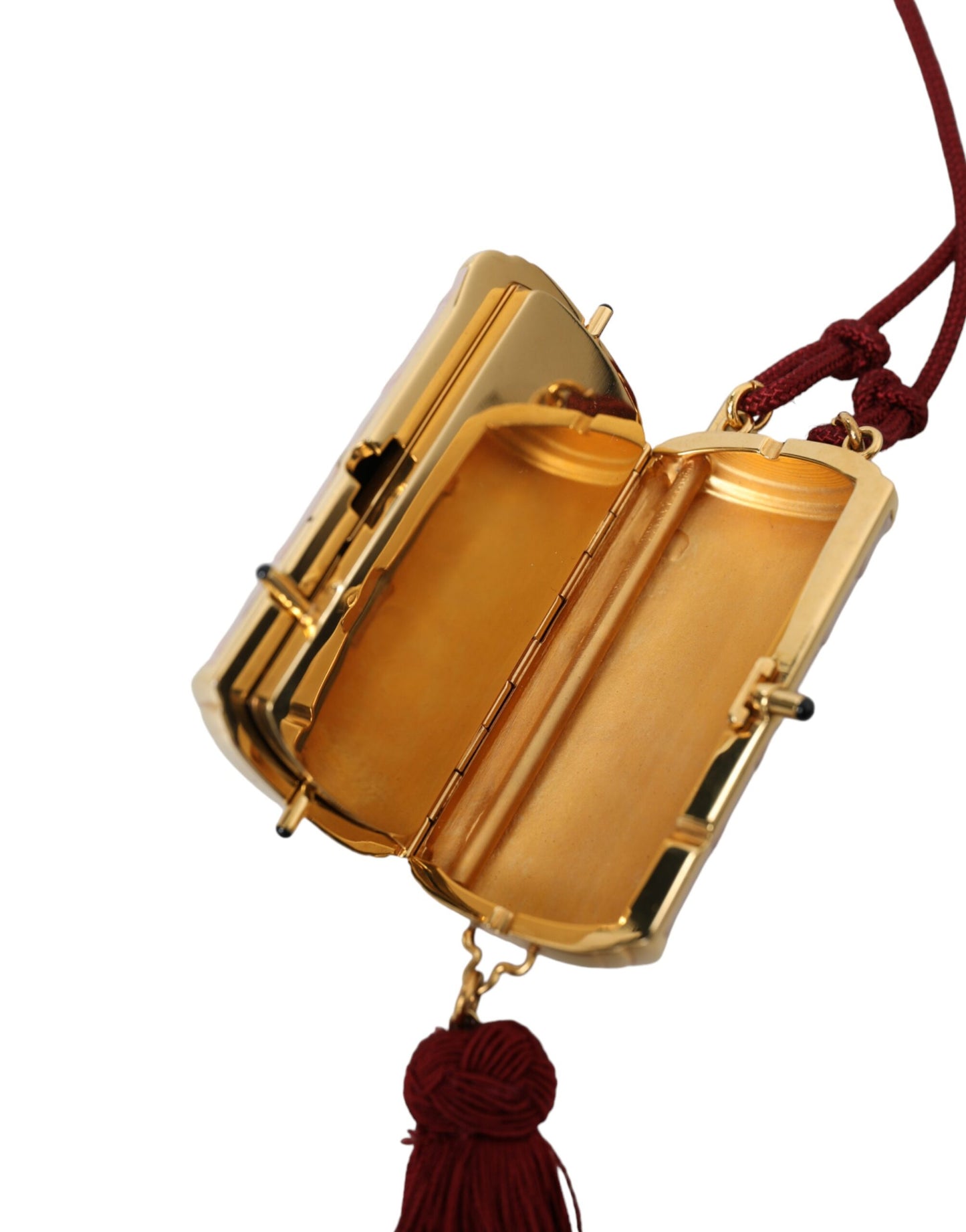 Mini Makeup Bag by Dolce & Gabbana for unisex in exotic leather gold & pink features a edgy silhouette, showcasing the design of this Exotic Leather Mini Makeup Bag with a secure clasp, organized , and versatile .
