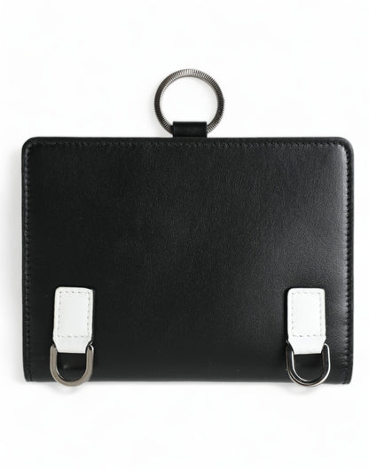 Cardholder Wallet by Dolce & Gabbana for women in calf leather black & silver showcases a discerning silhouette, artfully capturing the essence of Calf Leather Cardholder Wallet with its functional card-organization.