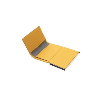 Wallet by Cerruti 1881 for women in calf leather yellow showcases a discerning silhouette, artfully capturing the essence of Calf Leather Wallet with its functional compact-design.