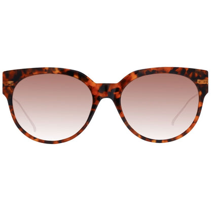 Sunglasses by Scotch & Soda for women in acetate and brown presents a sumptuous silhouette, featuring brown coloured frame and full-rim round frame design with gradient category-2-medium-tint lens for a sumptuous look.