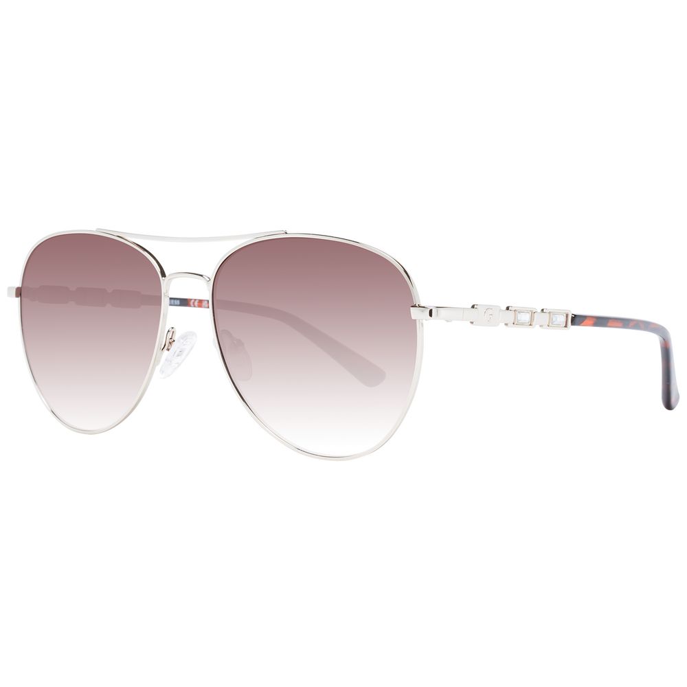 Sunglasses by Guess for women in metal silver showcases a ethereal silhouette, featuring silver coloured frame aviator full-rim frame design with gradient category-3-dark-tint lens for a ethereal finish.