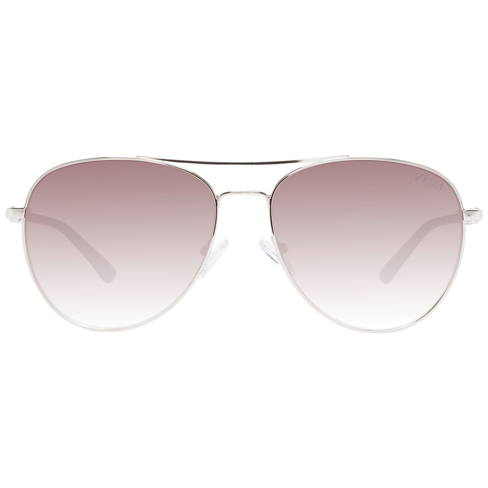 This Sunglasses by Guess for women in metal silver presents a sumptuous silhouette, showcasing a sumptuous aviator full-rim frame design in silver coloured frame and high-performance gradient category-3-dark-tint lens.