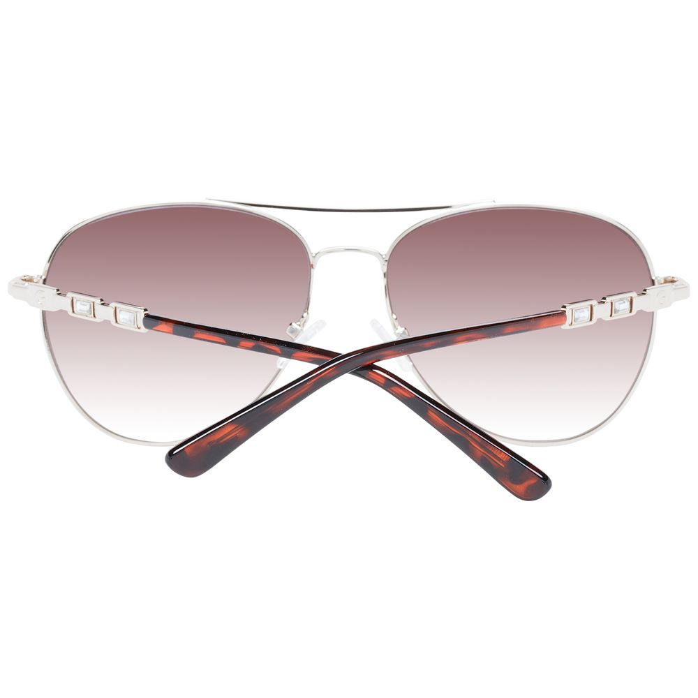 Sunglasses by Guess for women in metal silver features an lustrous aviator full-rim frame design with silver coloured frame detailing and gradient category-3-dark-tint lens for a lustrous aesthetic.